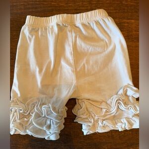 Ruffled White Shorts with ruffles.